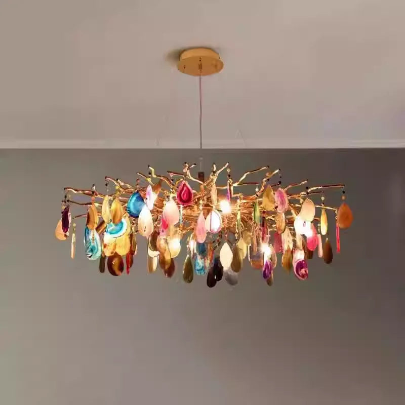 Art deco chandelier in a bright living room, showcasing its vibrant agate slices and sophisticated design.