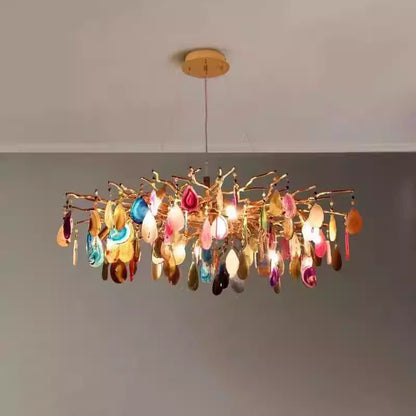 Art deco chandelier in a bright living room, showcasing its vibrant agate slices and sophisticated design.