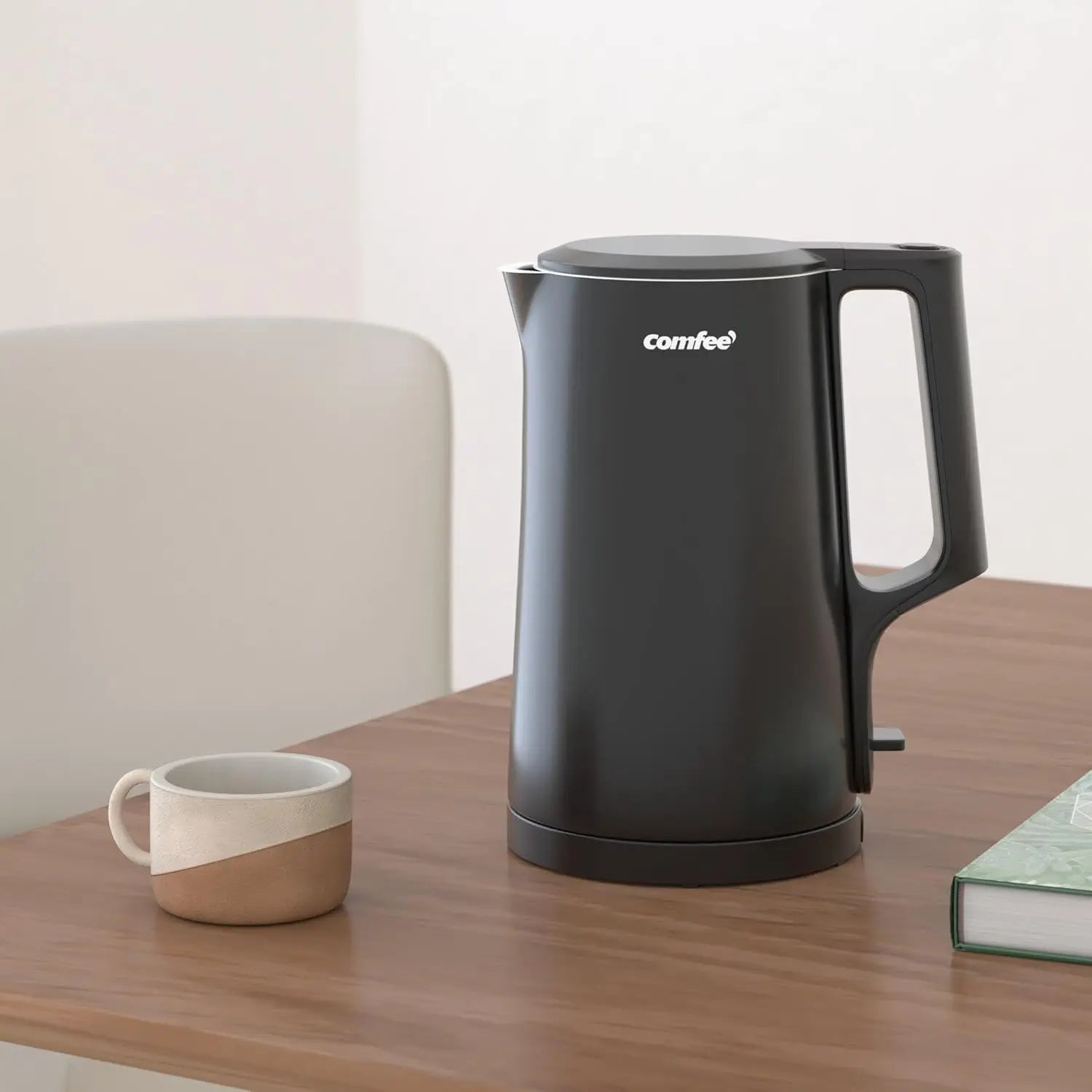 Comfee’ 1.7L Black Double Wall Electric Kettle featuring a sleek design and 304 stainless steel interior, perfect for your tea and coffee.