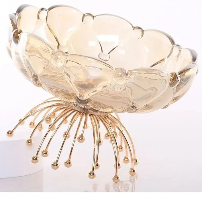 Stylish Amber Glass Flower Bowl with Beaded Metal Base - Relaxing evening setting featuring the amber glass bowl in warm lighting, enhancing ambiance.