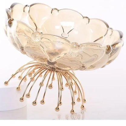 Stylish Amber Glass Flower Bowl with Beaded Metal Base - Relaxing evening setting featuring the amber glass bowl in warm lighting, enhancing ambiance.
