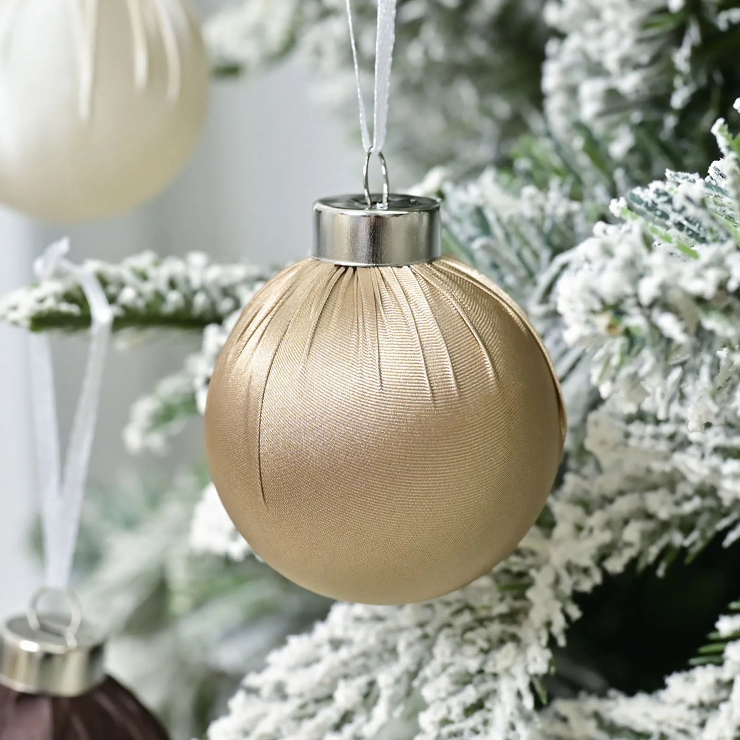 Set of shatterproof satin silk ball ornaments in a stylish vintage display, perfect for holiday home decor.