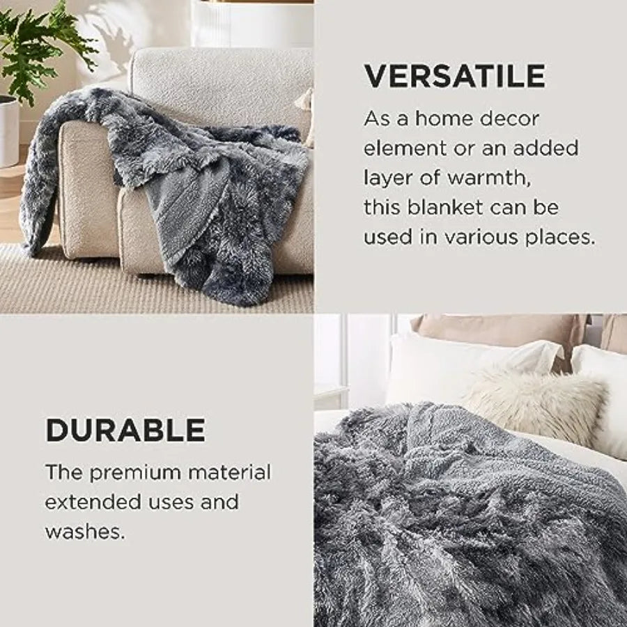50x60 Grey Faux Fur Sherpa Throw Blanket, Plush Reversible on a bed for added comfort.