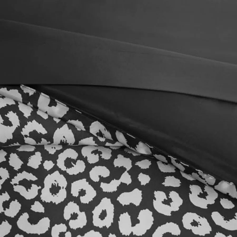 Decorative pillow from the Black Leopard Satin Comforter Set adding a touch of elegance to your satin comforter set.