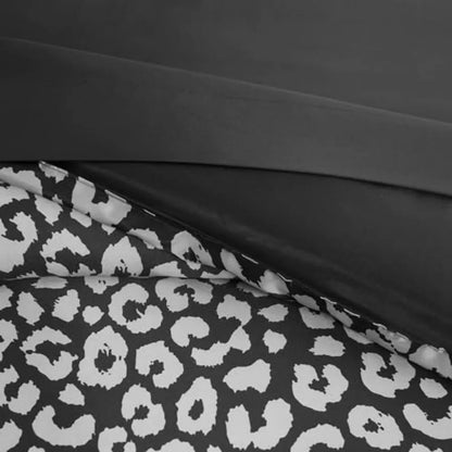 Decorative pillow from the Black Leopard Satin Comforter Set adding a touch of elegance to your satin comforter set.