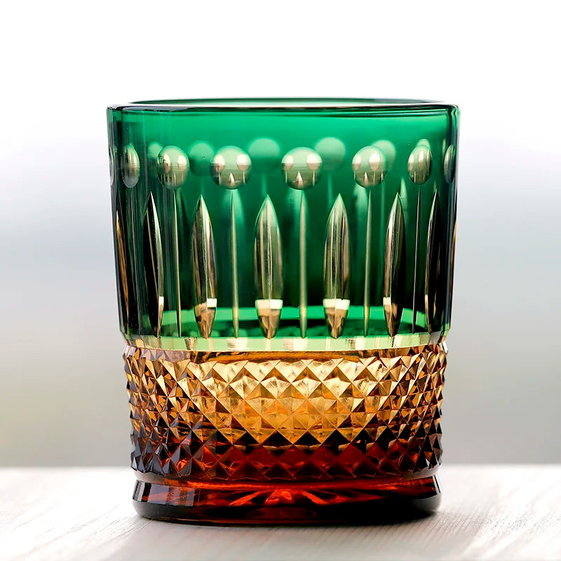 Close-up of the Premium Hand-Cut Whiskey Glass – Lead-Free Crystal Edo Kiriko Tumbler showing its stunning amber base and geometric design, ideal for upscale home bar decor.