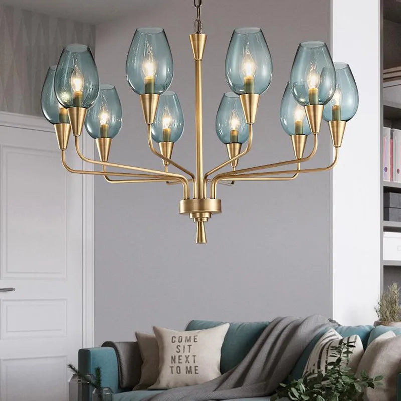 Stunning Modern LED Chandelier in Blue and Matte Brass - Elegant Lighting for Your Home, showcasing stylish blue glass and brass details, perfect for contemporary decor.