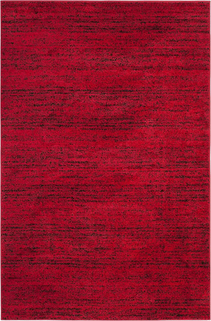 Functional elegance of the Modern Black & Red 6' x 9' Loomed Area Rug in a home office, perfect black and red rug for busy households.