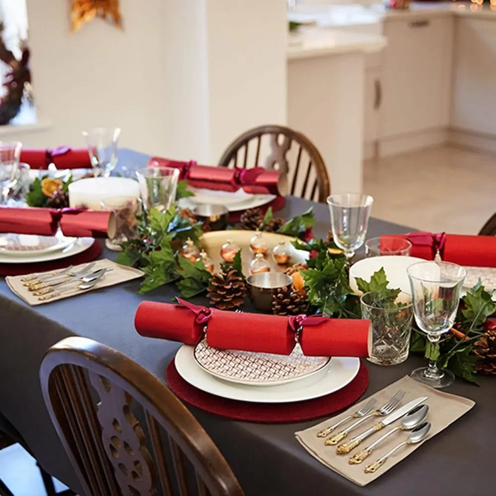 Artistic arrangement of the Everly Quinn Luxury Gold Accent Flatware Set on a white marble dinnerware backdrop, highlighting the luxury flatware set's designer appeal.