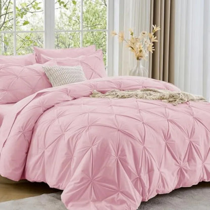 Relax in style with the Queen comforter set, featuring a chic pinch pleat design that effortlessly blends luxury and comfort for a hotel-like experience.