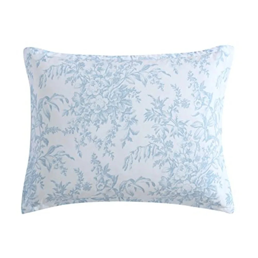 Details of the Bedford Blue Floral Comforter Set showing the tailored blue-and-white stripe reverse side, adding chic versatility to your decor.