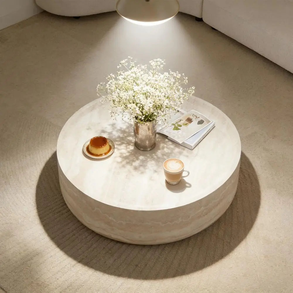 Faux marble coffee table with solid drum base and non-slip pads, perfect for stable everyday use.