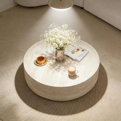 Faux marble coffee table with solid drum base and non-slip pads, perfect for stable everyday use.