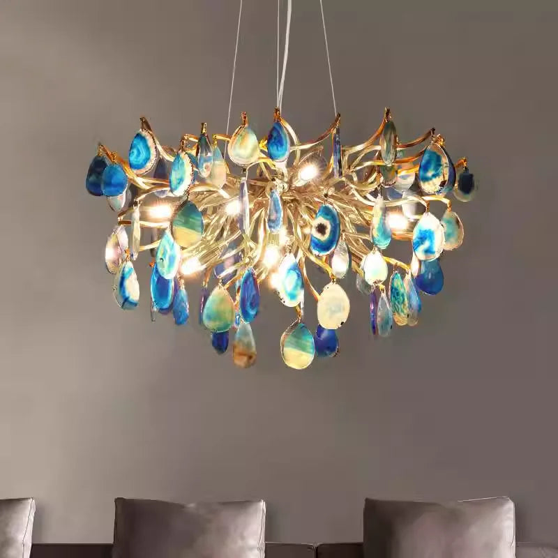 Close-up view of the art deco chandelier showcasing vivid agate slices in orange and blue, perfect for stylish decor.