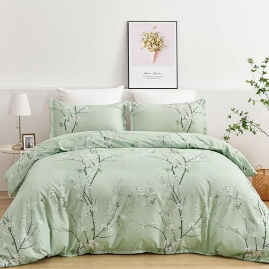 A wide shot of the Sage Green & Yellow Floral Duvet Cover Set Queen layered with textured blankets, illustrating the calming effect of the sage green floral duvet.