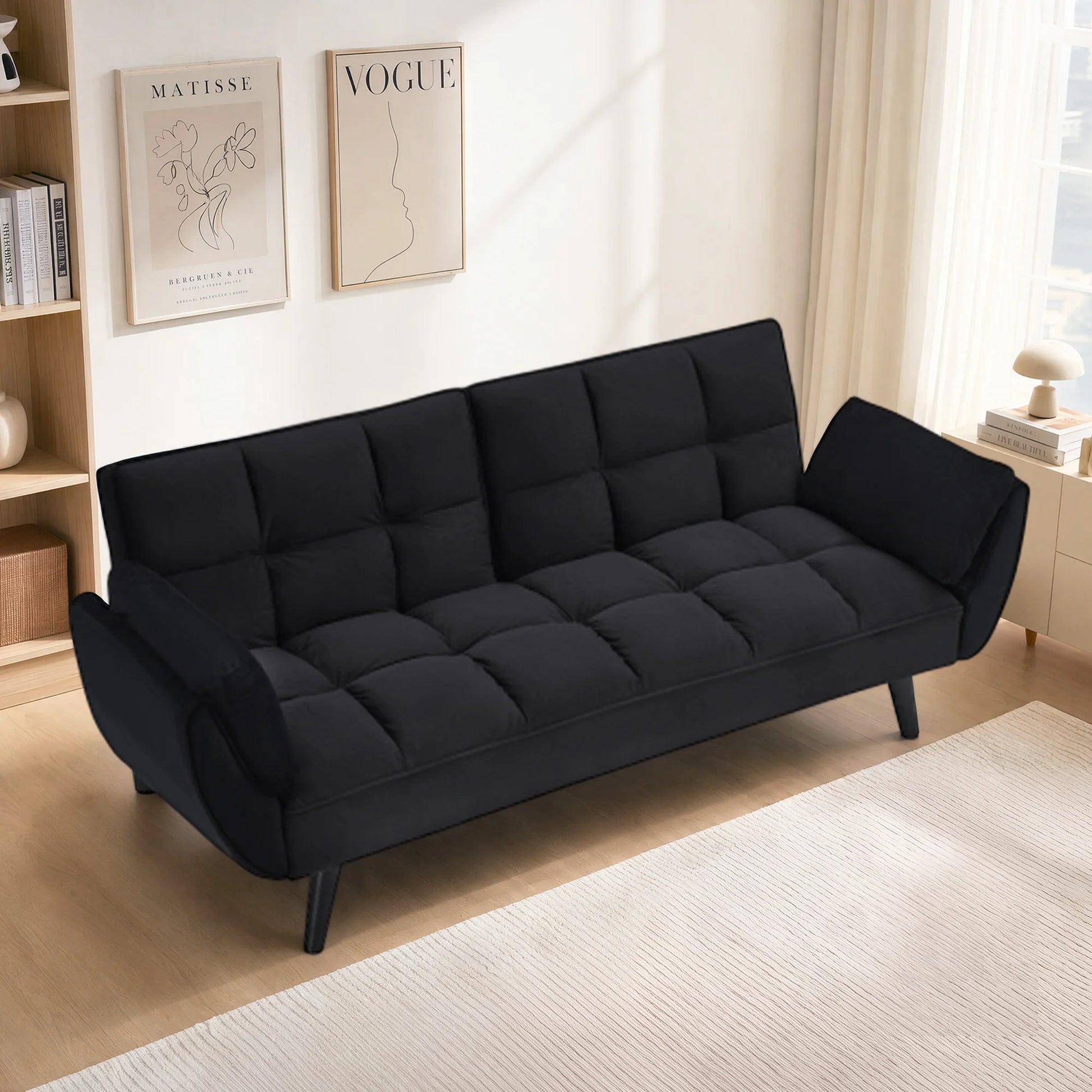 57" Velvet Convertible Futon Sofa Bed in black, a stylish convertible futon sofa perfect for small space living.