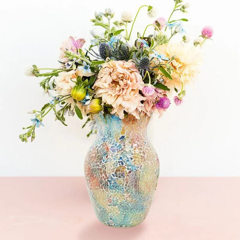 Close-up of the stunning iridescent finish on the 8" Handcrafted Cracked Glass Flower Vase, a beautiful handcrafted glass vase with mosaic details.
