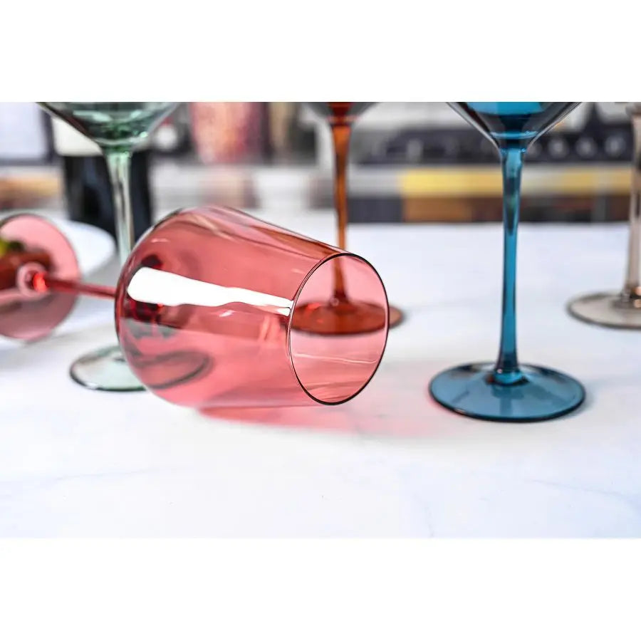 A collection of 6 Art Deco wine glasses in soft pastel hues, each offering a one-of-a-kind look for stylish entertaining.