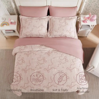Complete 7 Piece Luxury Blush Pink Bowknot Comforter Set arranged on a bed, highlighting this stylish blush pink comforter set.