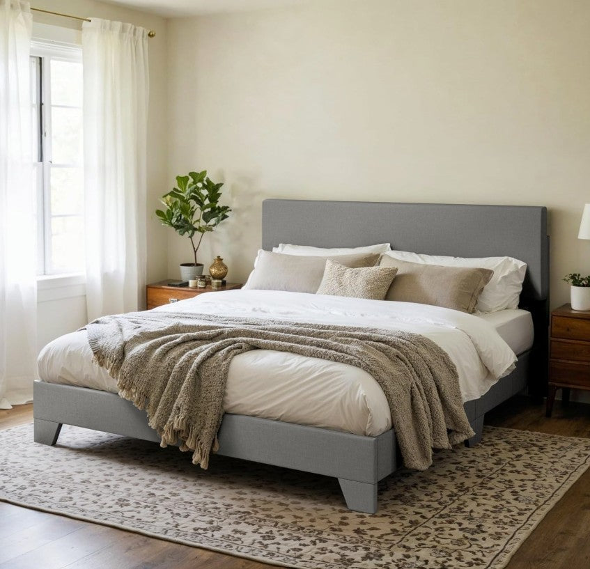 Nightstand and Decor - Complete your modern bedroom look with the upholstered platform bed and stylish accents.