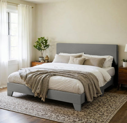 Nightstand and Decor - Complete your modern bedroom look with the upholstered platform bed and stylish accents.
