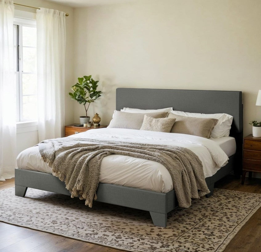 Versatile Bed Frame - The upholstered platform bed fits any contemporary bedroom decor.
