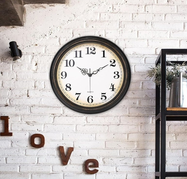 Vintage Bronze Wall Clock displayed against a backdrop of warm-toned decor.