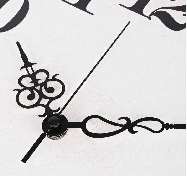 Artful arrangement featuring the Vintage Wall Clock and other rustic home decor.