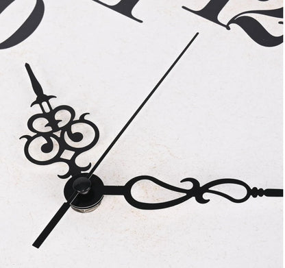 Artful arrangement featuring the Vintage Wall Clock and other rustic home decor.