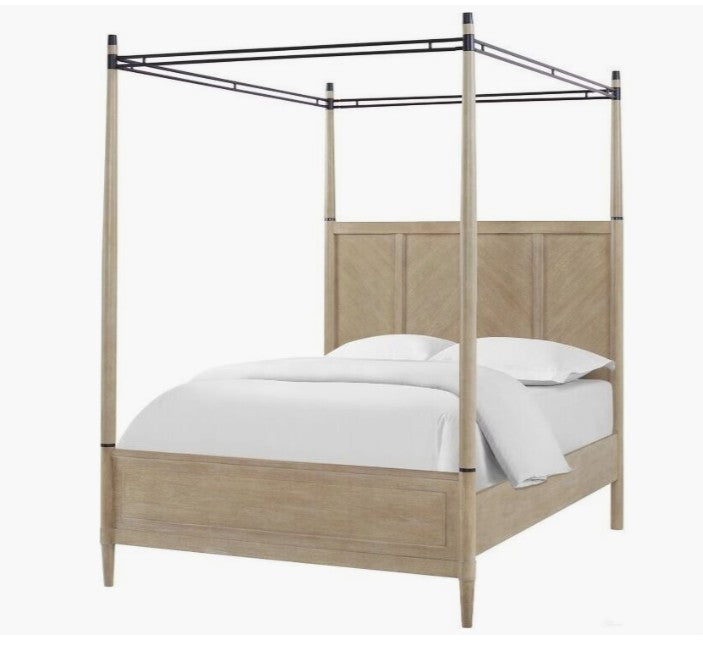 Wilmington Canopy Bedroom Set in Sand with elegant detailing on the nightstand contributing to the overall luxury look.