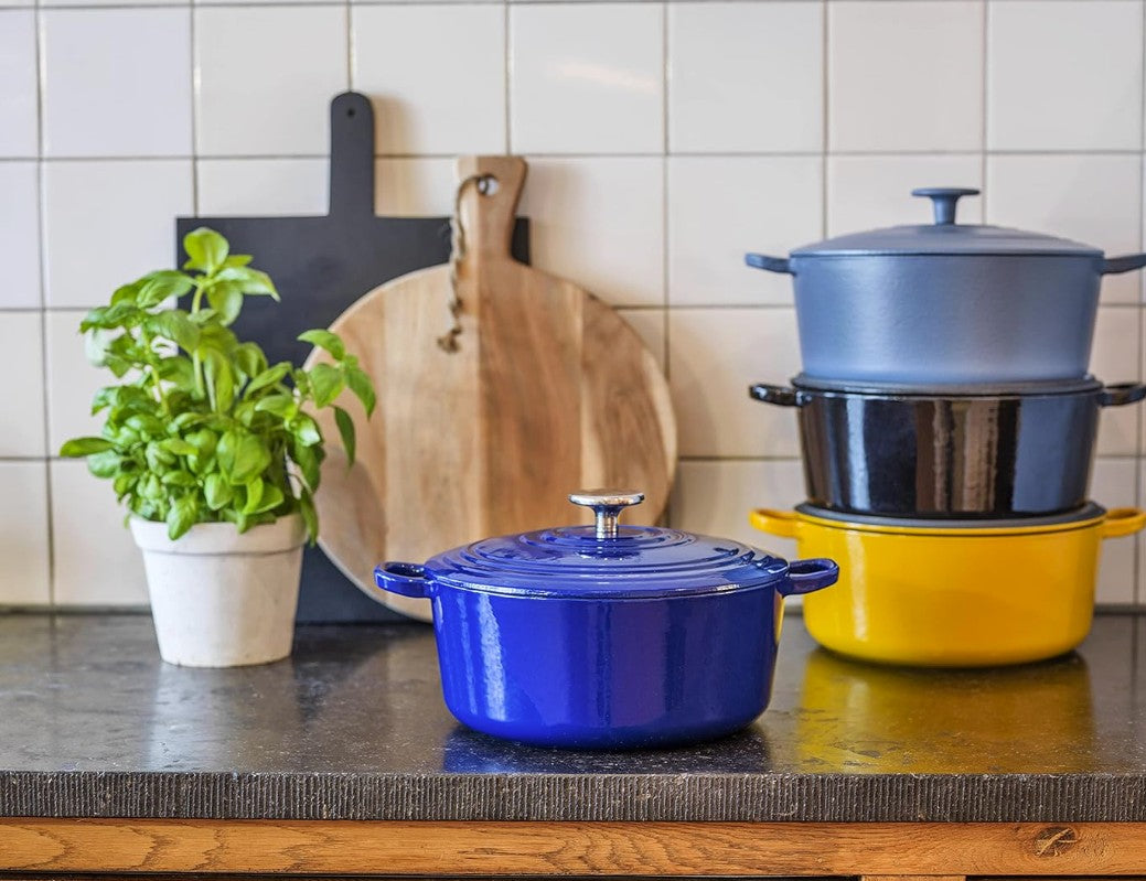 Highlighting the BK Bourgogne 7QT cast iron dutch oven, a blend of style and practicality in chili red.