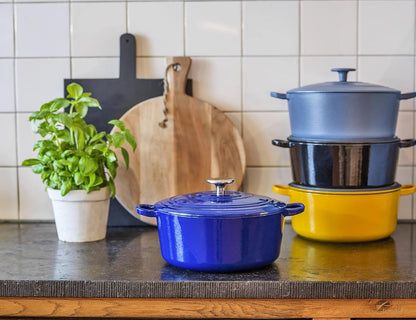 Highlighting the BK Bourgogne 7QT cast iron dutch oven, a blend of style and practicality in chili red.