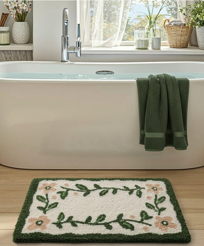 A vibrant 32x20 Microfiber Floral Bath Mat, enhancing your bathroom decor with its beautiful floral print.