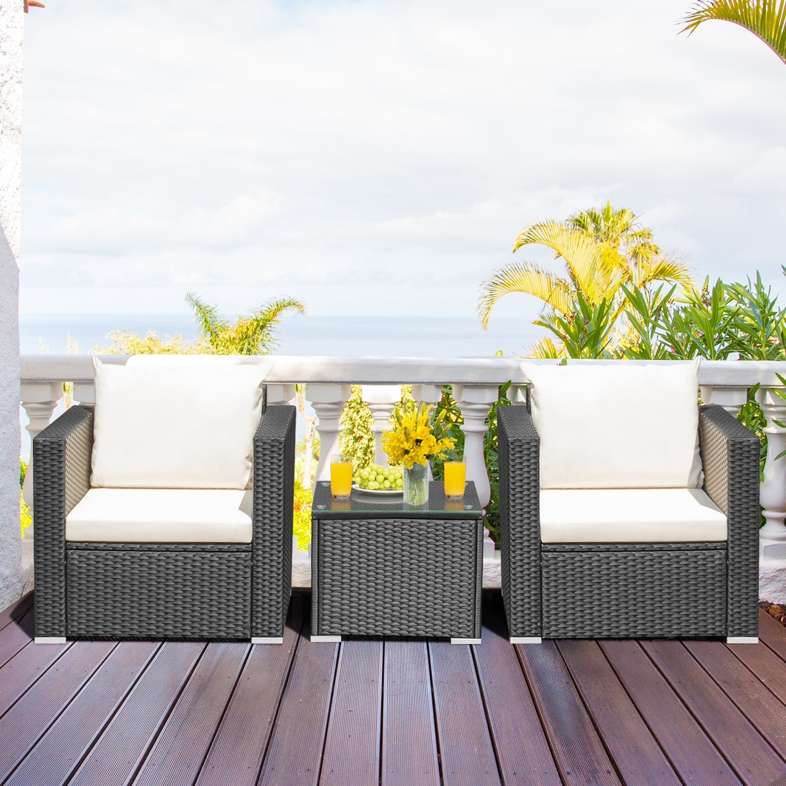 2 single sofas and glass table from the 3-Piece Outdoor Wicker Patio Conversation Set – cozy outdoor wicker conversation set for outdoor gatherings.