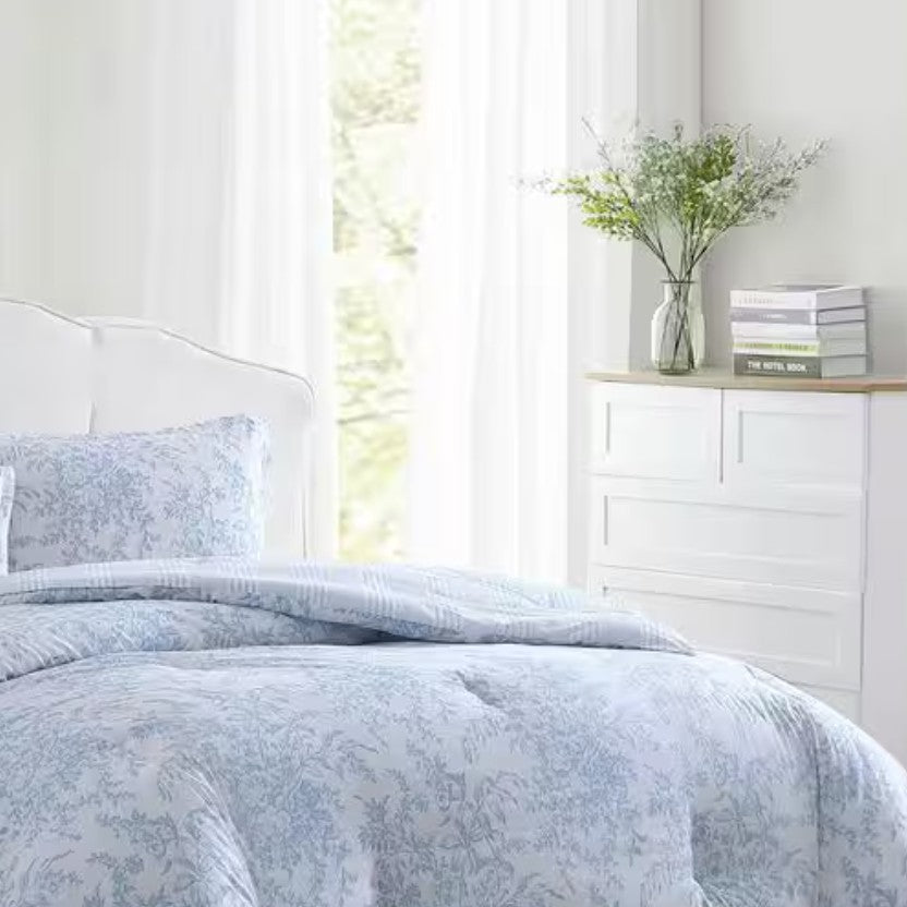 Seasonal display of the Bedford Blue Floral Comforter Set showing off its medium-weight, breathable cotton perfect for all seasons.