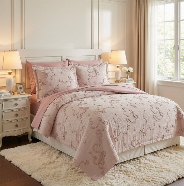 Luxury Blush Pink Bowknot Comforter Set displayed on a neatly made bed, demonstrating the beauty of this blush pink comforter set.