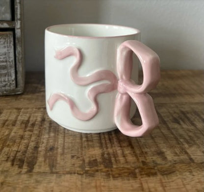 Room Essentials 17.22oz Cream Stoneware Bow Mug with Pink Handle, Microwave & Dishwasher Safe, microwave-safe stoneware coffee mug