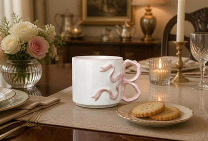 Room Essentials 17.22oz Cream Stoneware Bow Mug with Pink Handle, Microwave & Dishwasher Safe, stoneware coffee mug front view