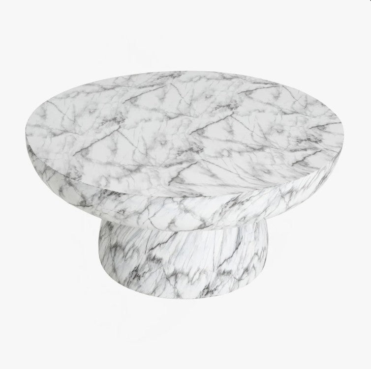 Durable and lightweight materials of the Patsy Luxe Faux Marble Pedestal Coffee Table, highlighting its all-weather suitability as a modern faux marble table.