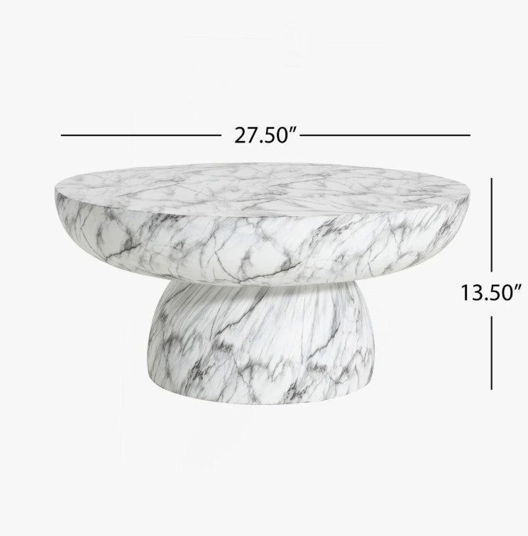The unique chunky pedestal base of the Patsy Luxe Faux Marble Pedestal Coffee Table adds stability, making it an ideal faux marble table for various settings.