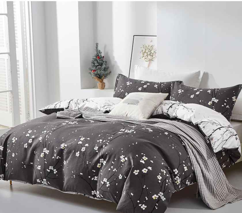 Elegant sage green floral duvet with sunny yellow accents for a fresh and calming bedroom decor.