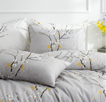 Sage green floral duvet cover showcasing hidden zipper closure and corner ties for secure fit.