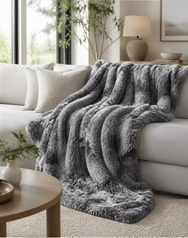 50x60 Grey Faux Fur Sherpa Throw Blanket, Plush Reversible folded neatly, showcasing its dual texture.