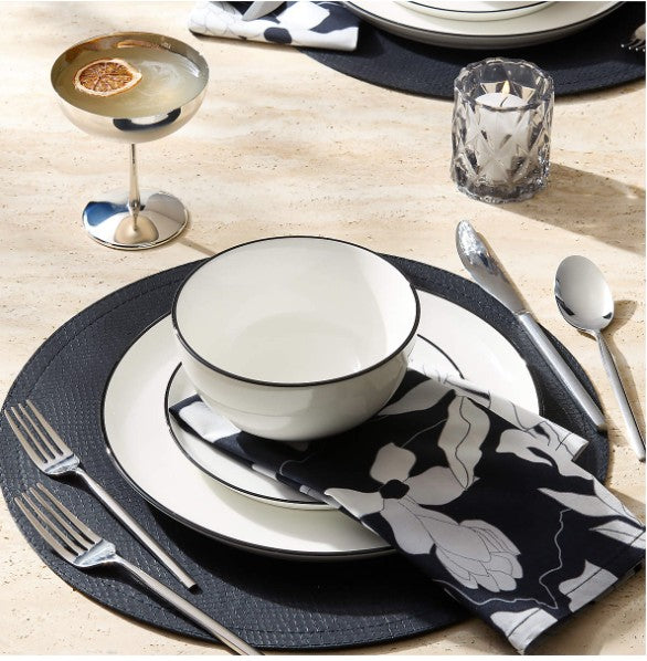 Elegant serving in the Cameron Fine Bone China Bowl featuring a sleek black rim, ideal for modern table settings.