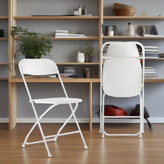 Commercial white folding chairs on a patio, showcasing their versatility for any outdoor event.