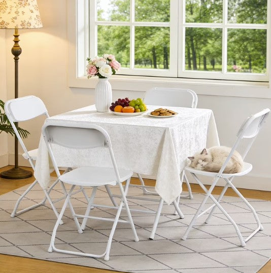 Flexible seating solution with white folding chairs arranged for a corporate event or meeting.