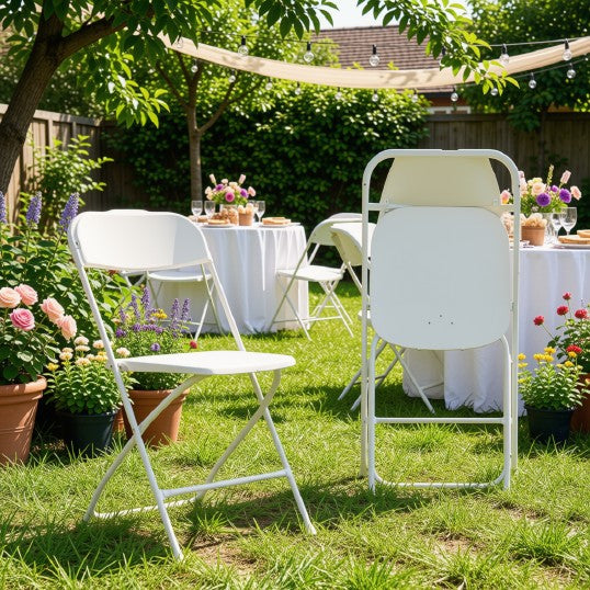 White folding chairs elegantly arranged at a reception, ideal for stylish seating at events.