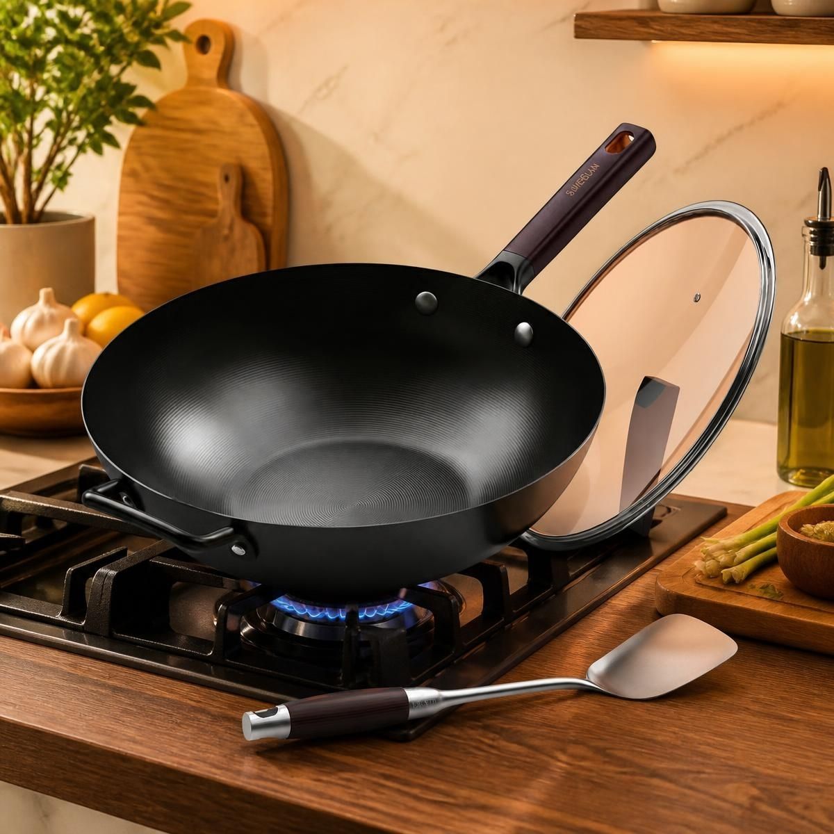 13.5-Inch Pre-Seasoned Carbon Steel Wok with Lid shown with organized kitchen utensils.
